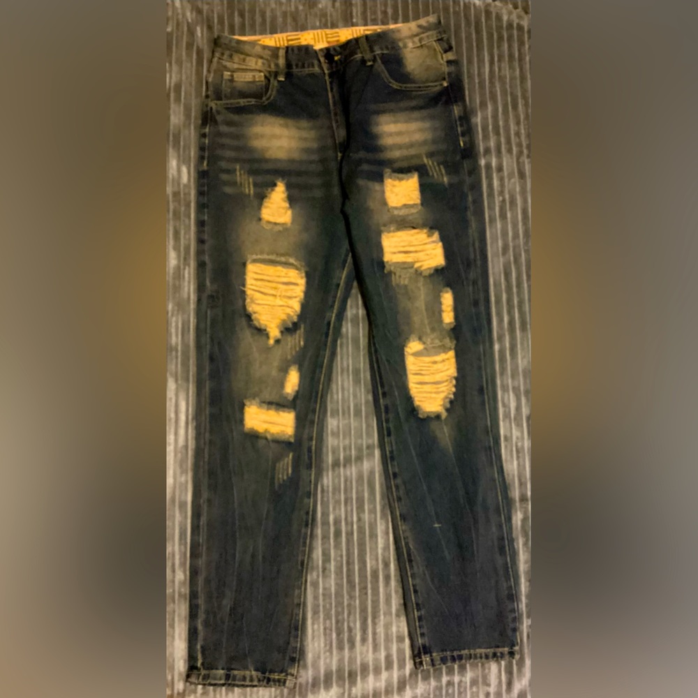 Men blue ripped jeans